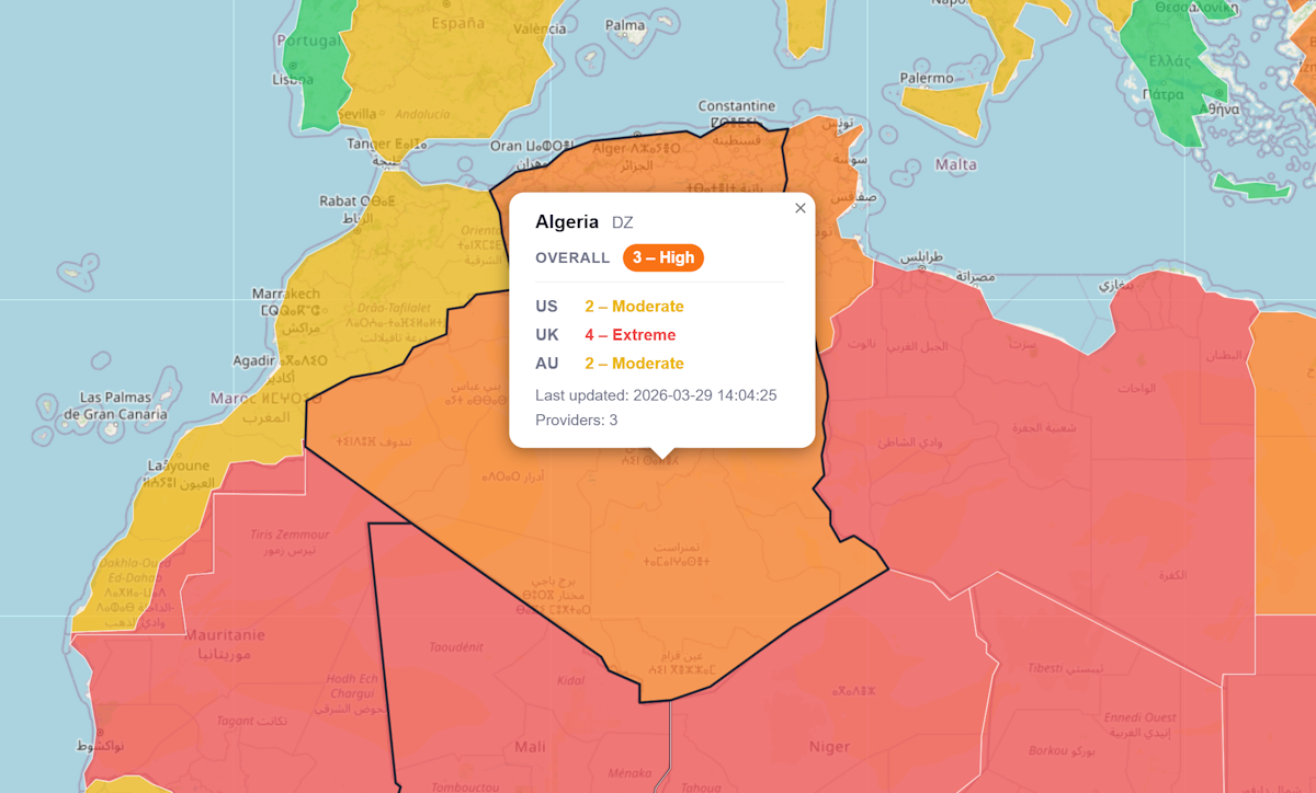 Voyage Risk portal country risk ratings map — world countries coloured by aggregated US, UK, and Australian government travel advisory levels.